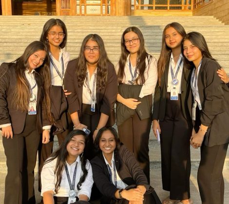 Gitam Junior College – Professional Student Portrait Group of young women students from Gitam Junior College posing in formal attire on campus steps.